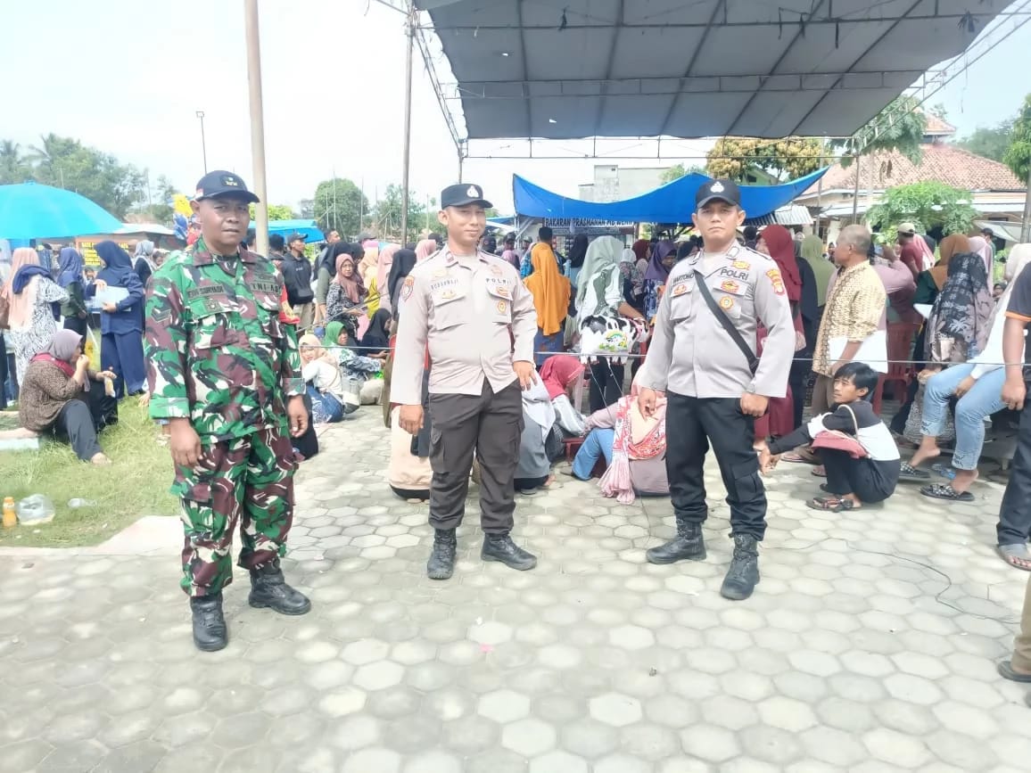 Polsek Bumi Agung Lakukan Pengamanan BLTS Kesra di Kantor Pos 34782 Pisang Baru
